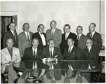 Sitting center front row is Mr. Courtney.  Sitting far right is Don Bond. Third and fourth from the left, respectivly, Dave Wislon and Joel Hannah.