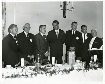 Mayor Charles Blissett, third from right attends a luncheon. Lester Haymann(second from left) and Harold Shamburger (far left) are also present during the luncheon.