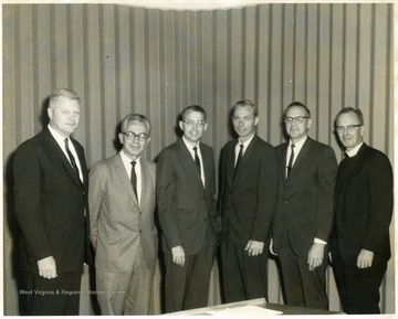 Man third from the right is Jerry Robbins.