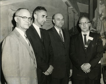 Second from left: 'Ernest J. Nesius, Director of Appalachian Center'. 