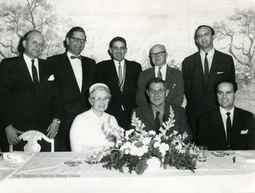 Second from left is 'Mr. Moreland' and on the far right is 'Mr. Singleton'. 