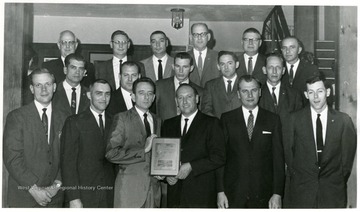 Top row, second from the left is Mr. James Benson.