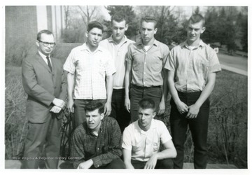 Kneeling, left to right: Ivan Stumpter and Sonny Bowers.  Standing, left to right: Mr. Marx, Jim Crislip, Roy Denjen, Roger Willard, and Phil Colebank.
