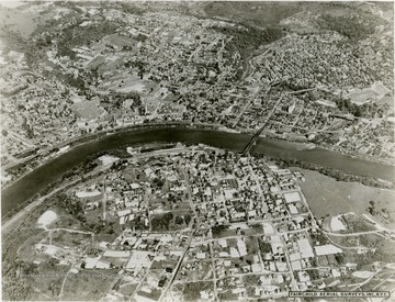 An aerial view of Morgantown and Westover. Monongahela River running through the middle. Mountaineer Field is to the left.