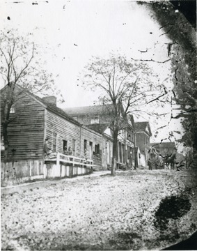 Unpaved Pleasant Street, possibly 1860s.