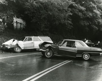 Two damaged cars at the scene of the accident. 