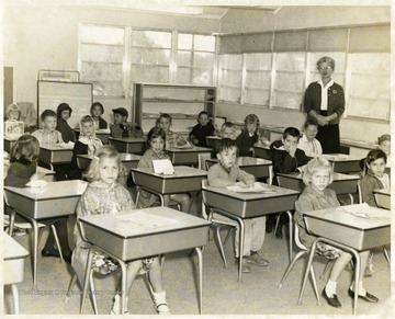 View of young children sitting at desks in Suncrest Grade School Classroom Morgantown, W. Va.