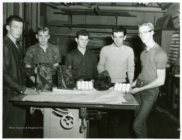View of members of the University High School Future Farmers of America in Morgantown, W. Va preparing ham, bacon, and eggs for a Federation show. Members include: Arthur Thompson, Dale Fox, Charles Everly, William Brown, and David Ruth.