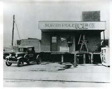 A truck is parked in front of the North Pole Ice Company in Morgantown, West Virginia.