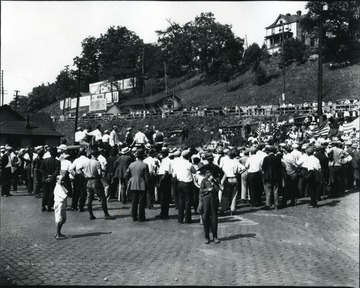 Groups of 'hungry marchers' gathered at a railway depot.