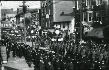 People gathered along High Street to see the Armistice Day Parade on High Street.