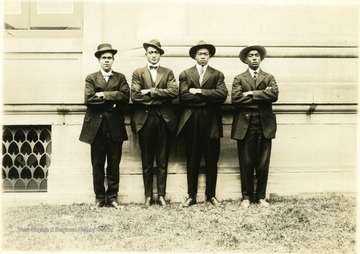 Four African-American World War I draftees in front of the post office.