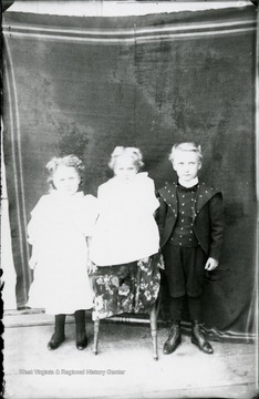 A portrait of J. B. Everly's three children.