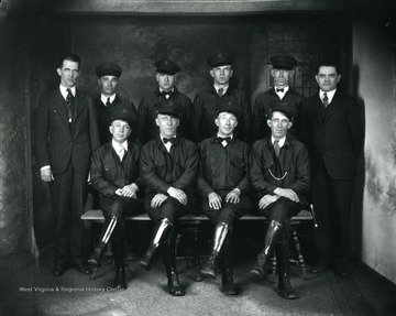 Group portrait of ten street railway employees of Monongahela-West Penn Power Company.
