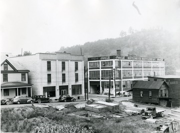 Coca Cola Bottling Works at the corner of Clay and Wharf Street.