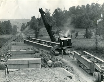 Men working to build a bridge in Barbour County.