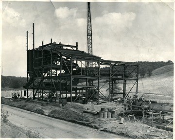 View of the steel frame of a building that is under construction.