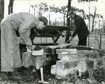 Building a stone structure at Babcock State Park, it could be an outside barbecue grill.