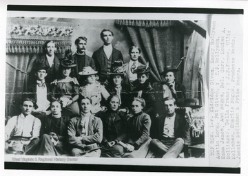 Group portrait including top row, left to right: Eldridge Given, Emery Rollyson, Austin Long, Pat Given, T. P. Rollyson, Emma James, Ann Boggs, Del. Carr, Louisa A. Bollinger, Della Frame, J. P. Frame, Ollie Mallahan, Charlie Boggs, Prudence Woods, Jessie Mollahan, and Price Boggs.