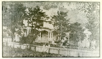 'Gauley Mount, home of Colonel C. Q. Tompkins. A few years before the war Colonel C. Q. Tompkins, a West Point engineer, came to Paint Creek to open mines. Two miles from Gauley Bridge, on a picturesque point, he built a summer home and brought his family from Richmond. Colonel Tompkins was active in the Confederate cause in the early days. The family continued to reside at Gauley Mount for a long time after Union forces were in possession of the country and it was a pleasant place for General Cox and other officers to visit. The Tompkins family was finally sent through the lines to Richmond. The fine mansion was carelessly allowed to burn by Union soldiers quartered in it.'