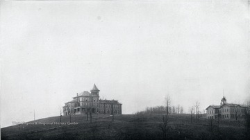 A view of the administration building at the West Virginia Industrial Home for Girls. The school building is seen on the right.