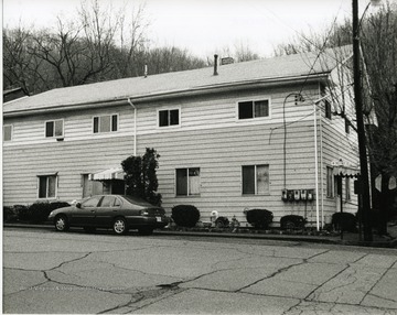 Car is parked in front of a house on Chestnut Street in the Old Town District in New Cumberland, Hancock County.