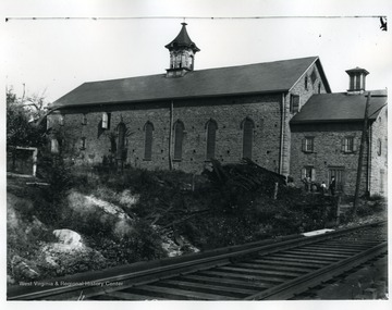 Close-up view of a Cold Storage House, near railroad tracks in Hancock County.