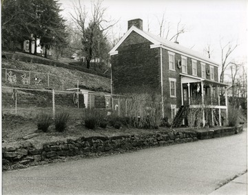 A brick house decorated for Christmas in the Old Town District in New Cumberland, Hancock County, West Virginia.