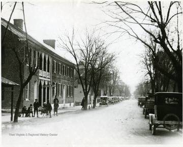 View of Main Street Looking South From Beans Garage in Hardy County. Heltzel Hotel - Old South Branch Hotel. This old building was erected in 1847 according to the information gathered.
