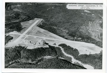 'Kanawha Airport, Charleston, W. Va., Elevation 985 feet, Class 4; Northeast-Southwest Runway 5200 feet.  Northwest-Southeast Runway 4750 feet; More than 9,100,000 cubic yards rock and earth moved in its construction.  Four and one half miles highway distance from downtown Charleston.'