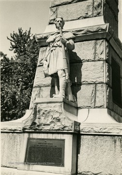 View of a statue on the base of the Battle of Point Pleasant monument.