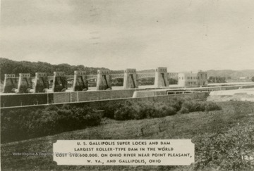 View of the U. S. Gallipolis Super Locks and Dam. The dam is the largest roller-type dam in the world. The cost was $10,600,000. It is located on the Ohio River near Point Pleasant, West Virginia, and Gallipolis, Ohio.