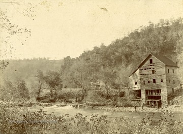 View of an old mill at Royal Glen. 'The Frederick Mill was burned when the Royal Glen Dam was built. Susan Hyre kept the boarders and invalids in her old home in the back.'