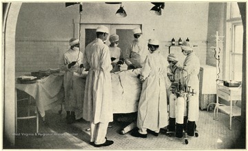 View of nurses and surgeons in an Operating Room at Welch Hospital No. 1, McDowell County, W. Va.