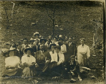 Charles Alexander Keadle sits with his class, probably a teacher's institute, in Monroe County. Keadle later became superintendent of schools. Suggested and organized the corn clubs that were the fore runner of the 4-H clubs.