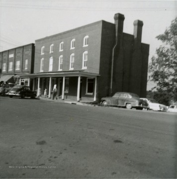 'James M. Byrnside's store building in Union (about 1850.) Now the Bank of Monroe, July 1962.  (The Bank of Monroe was in building - John Rowan, attorney and the Monroe Watchman have occupied this old building.')