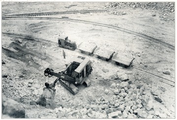 'Although best known as the principal raw mineral in the manufacturing of glass, Silica sand finds wide use in many other important industries. During the war it was listed as a critical material being used in the manufature of aircraft enginces, steel castings, armor plate, silicate of soda, electrical porcelain, refactories, and many other important was materials. Pennsylvania Glass Sand Corporation's operation in Morgan County is the largest glass deposit in the world.'