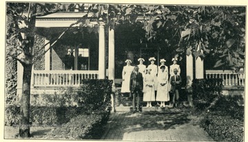 Medical and Nursing Staff are standing in front of Fairmont Hospital No. 3, in Fairmont, West Virginia. 'Fairmont Hospital No. 3: R. H. Powell, M.D. Superintendent. This institution is located at Fairmont, Marion County, and is reached by the Baltimore and Ohio Railroad, and by the lines of the Monongahela Valley Traction Company.'<br />
