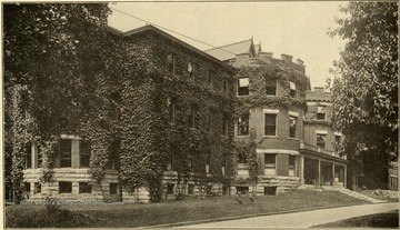 Building number 1 for male patients at the West Virginia Asylum. L. V. Guthrie, M. D., Superintendent. This institution is located at Huntington, Cabell County, and is reached by the Baltimore and Ohio, Chesapeale and Ohio, Virginia Railroads; by the interurban line of the Ohio Valley Electric Company, by Ohio River steamboats. Number of patients July 1, 1914 was 636.