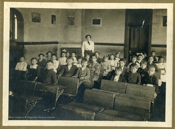 'Elkhorn Graded School. First grade second term taught by Bess E. Smith. From the C.A. Keadle Collection. School probably in Monroe County, West Virginia.'