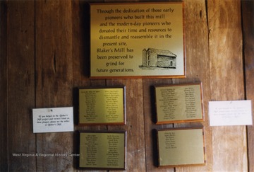 A view of some plaques commemorating those who have supported the preservation of Blaker's Mill.  Blaker's Mill is a Greenbrier County mill, relocated to Jackson's Mill.