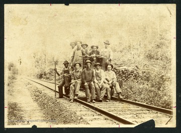 The Section that kept the trains on the track, operating their 'strongarm.'  Pictured; 1st Row: Guy Holmes, Lacy Shrewsbury, Jim Smith, Henry Morls, J.B. Holdren.  Back Row: unidentified, Z.M. Lafon, Vick Leily, Henry Shrewsbury, C.R. Holdren.