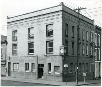 'Building is located at corner of Temple St. and Third Ave.'