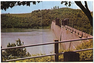 'Tygart Dam on Tygart River near Grafton backs-up a large man-made lake where swimming, fishing, boating, and picnicking can be enjoyed.'