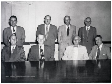 Standing left to right:  H. G. Humphries, A. H. Lough, A. F. Bush, F. W. Sawyers.  Sitting left to right:  F. L. Boone, W. F. Bush, President E. P. McCreery, R. C. Haynes. (E. Tomkies absent)