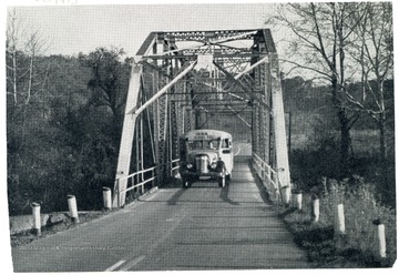 A school bus crosses the Twelve Pole Creek Bridge in Wayne County, W. Va.