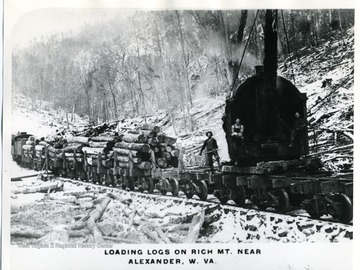 Several men are loading logs on Rich Mountain near Alexander, Randolph County, West Virginia.