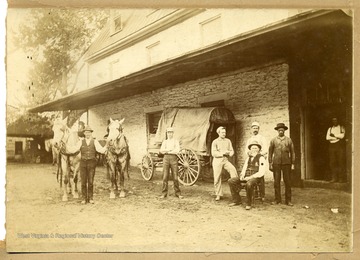 Men in front of a Livery Stable, New Martinsville, Wetzel County, W. Va.