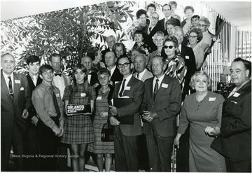 Front row left to right, Berlin Blehapmon and Presidents David Cressler, David Gilkeson, and Mary Holdren.  Holding the Record Book is Allen Gregory, salutatorian '41, and Mrs. Gregory, extreme right are Dr. and Mrs. N. Myrle McClung.  McClung was class sponsor '41.