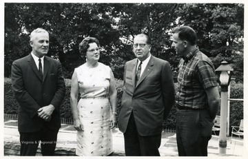 'Left to right:  Charles Harriman, Mrs. J. W. Ruby, J. W. Ruby, Harry VonIderstine, Festival Chairman.'